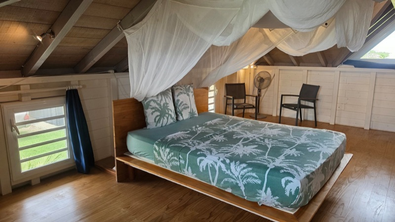 La suite parentale, en mezzanine sous la charpente